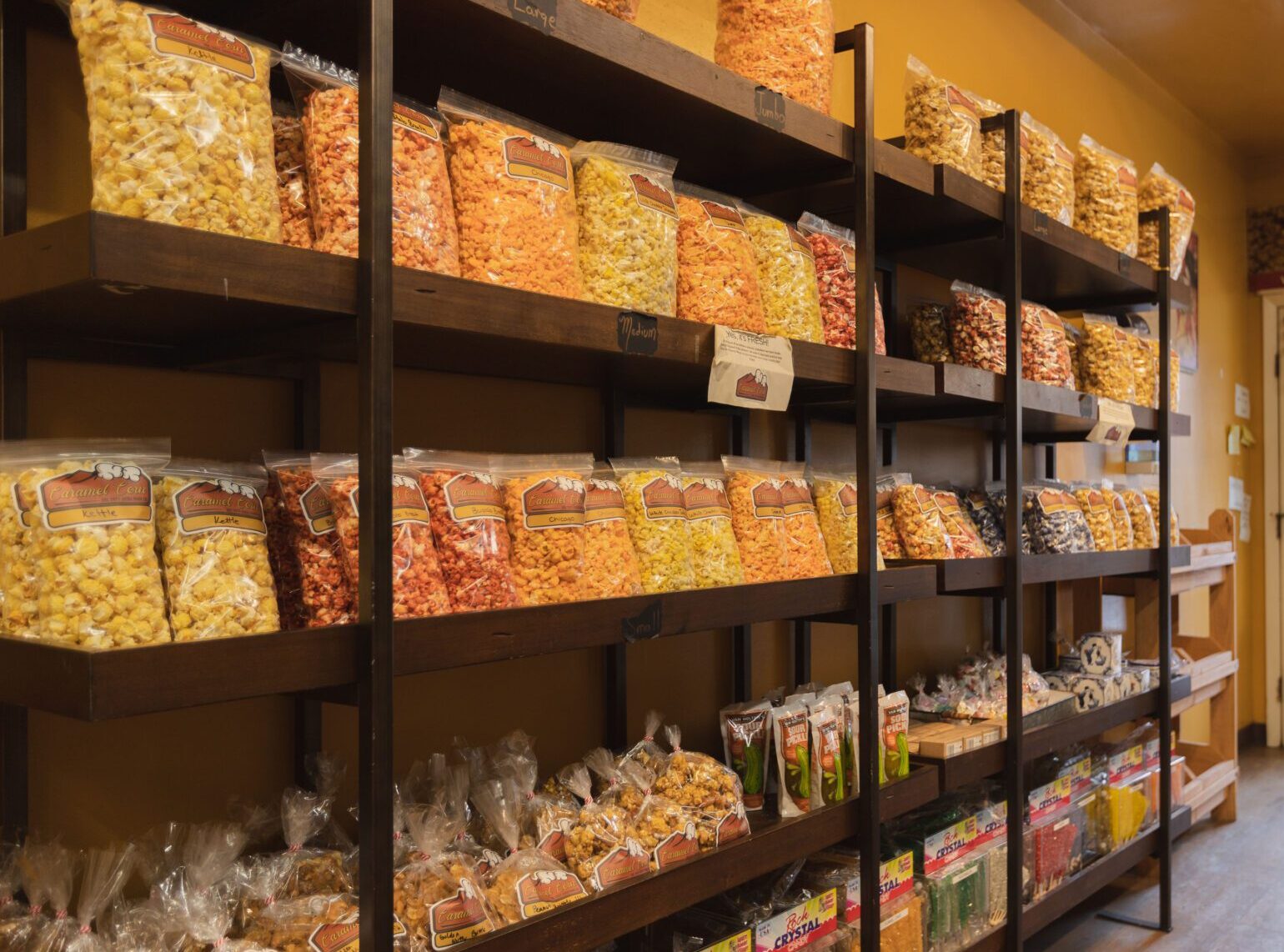 Caramel Corn on shelves Caramel Corn Colorful popcorn display with taffy